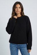 Black pull oversize maille côtelée closeup
